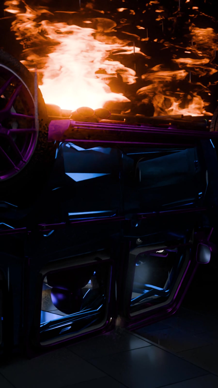 The overturned blue Mercedes burning